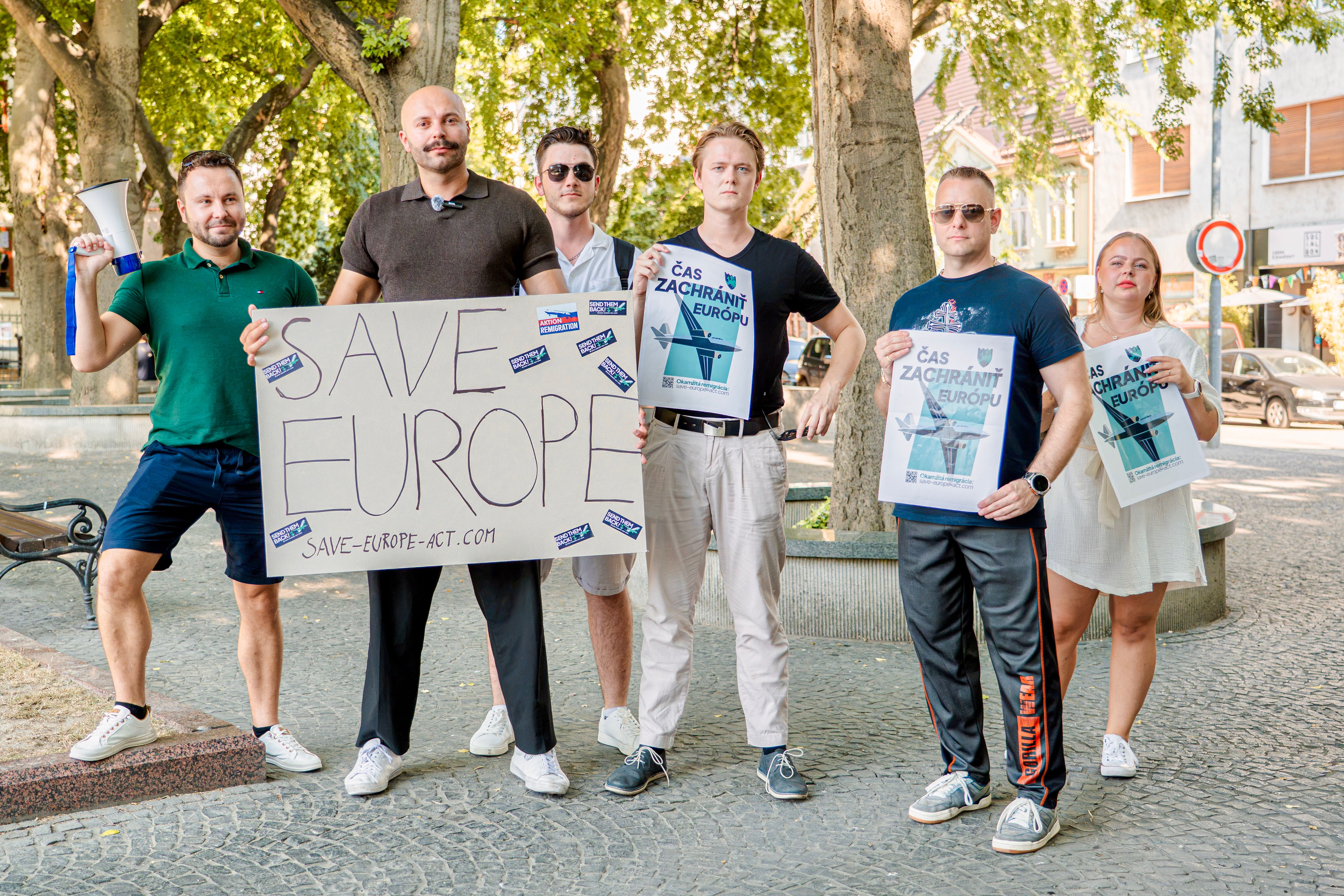 Poster Action by Slovak Volunteers in fron of Spanish Embassy