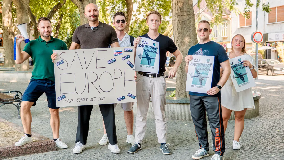 Poster Action by Slovak Volunteers in fron of Spanish Embassy